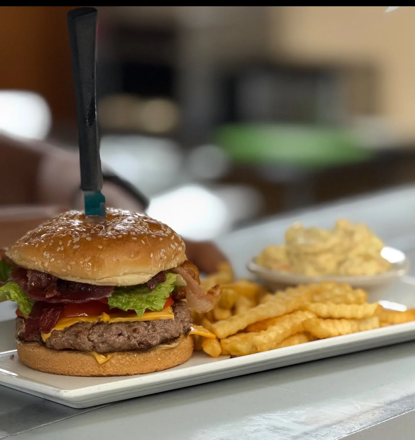 Cowboy Burger with fries at Chuck Wagon Restaurant
